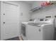Laundry room featuring washer and dryer, providing convenience for laundry tasks at 817 Benton Lake S Dr, Deland, FL 32724