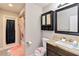 Updated bathroom with a shower/tub combo and granite vanity sink with updated fixtures at 9338 Palm Tree Dr, Windermere, FL 34786