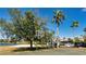 Community recreation area featuring basketball court, playground, and lakeside volleyball court at 1027 Algare Loop, Windermere, FL 34786