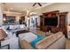 Inviting living room with tiled floors, large windows, and a comfortable seating area at 1027 Algare Loop, Windermere, FL 34786