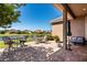 Brick paved lanai with dining and lounge seating offering a stunning view of the serene lake at 1027 Algare Loop, Windermere, FL 34786