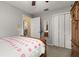 Comfortable bedroom featuring ample closet space at 1034 Featherstone Cir, Ocoee, FL 34761