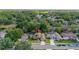 A well-maintained single-story home with a manicured front yard and driveway at 1034 Featherstone Cir, Ocoee, FL 34761
