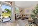 Inviting living room featuring bright natural light, neutral colors, and stylish décor at 1034 Featherstone Cir, Ocoee, FL 34761
