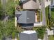 An overhead shot showcases the home's roof and yard in a well-established residential area at 109 Grinnell Pl, Celebration, FL 34747