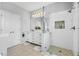 Modern bathroom features a double vanity, stylish mirror, and tiled shower at 109 Grinnell Pl, Celebration, FL 34747