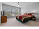 Bright bedroom with large windows and a ceiling fan at 109 Grinnell Pl, Celebration, FL 34747