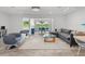 Bright and open living room featuring modern furniture, stylish decor, and plenty of natural light at 113 Tangelo Ct, Maitland, FL 32751