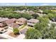 Aerial view of a residential neighborhood with mature trees and well-maintained homes at 14522 Old Thicket Trace, Winter Garden, FL 34787