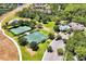 An aerial view of the community amenities, includes a pool, park and tennis courts at 14522 Old Thicket Trace, Winter Garden, FL 34787