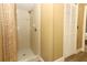 Bathroom featuring tile shower and ample storage at 1512 Southwind Ct, Casselberry, FL 32707