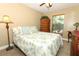 Cozy bedroom with natural light and tasteful decor at 1512 Southwind Ct, Casselberry, FL 32707