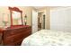Bedroom featuring wood furniture and neutral walls at 1512 Southwind Ct, Casselberry, FL 32707