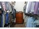 Walk-in closet with organization shelves and rods at 1512 Southwind Ct, Casselberry, FL 32707