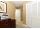 Hallway with built-in closet and office desk at 1512 Southwind Ct, Casselberry, FL 32707