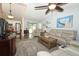 Open-concept living area seamlessly connects to the kitchen, creating a bright and welcoming space at 1512 Southwind Ct, Casselberry, FL 32707
