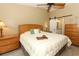 Bedroom with natural lighting, sliding door to bath, and contemporary ceiling fan at 1512 Southwind Ct, Casselberry, FL 32707