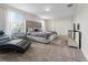 Cozy bedroom with a plush bed, mirrored furniture, and lots of natural light at 1571 Palmero Way, Davenport, FL 33896