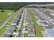 This is an aerial view of a quiet neighborhood featuring many single Gathering homes with green lawns at 1649 Teagan Ln, Winter Haven, FL 33884