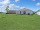 Expansive backyard and meticulously maintained lawn perfect for entertaining at 1649 Teagan Ln, Winter Haven, FL 33884