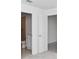 Hallway with doorway view to bathroom and bedroom at 1649 Teagan Ln, Winter Haven, FL 33884