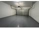 Clean two-car garage with epoxy flooring at 191 Chickasaw Berry Rd, Ocoee, FL 34761