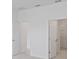 Hallway displaying access to multiple rooms at 2030 Firethorn Loop, Haines City, FL 33844