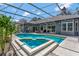 Aerial view of the backyard pool, spa and patio at 250 Shady Oaks Cir, Lake Mary, FL 32746