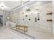 Luxurious shower with marble tiling, dual shower heads, and glass surround at 250 Shady Oaks Cir, Lake Mary, FL 32746