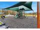 Community playground area featuring slides and playing space at 2572 Penguin Blvd, Davenport, FL 33837