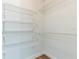 The closet is equipped with wire shelving for efficient storage and organization at 2839 Tamarack Trl, Apopka, FL 32703