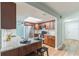 Updated kitchen with stainless steel appliances, granite countertops, breakfast bar and wood cabinets at 2839 Tamarack Trl, Apopka, FL 32703