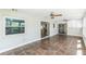 Large sunroom offers views to the interior and exterior at 2839 Tamarack Trl, Apopka, FL 32703