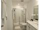 Bright bathroom features a glass-enclosed shower and modern fixtures at 3020 Water Sprite St, Orlando, FL 32808