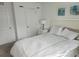 Bright bedroom with a neutral color palette, closet and stylish decor at 3020 Water Sprite St, Orlando, FL 32808