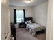 Cozy bedroom with a playful theme and comfortable furnishings at 3020 Water Sprite St, Orlando, FL 32808