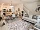 Inviting open-concept living space with a well-appointed kitchen, dining area, and living room for a modern lifestyle at 3020 Water Sprite St, Orlando, FL 32808