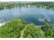 Stunning aerial view of the lake, showcasing the waterfront property at 3225 Hargill Dr, Orlando, FL 32806