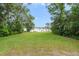 Expansive backyard and lake perfect for outdoor activities and relaxation at 3225 Hargill Dr, Orlando, FL 32806