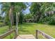 Stunning view from the backyard leading to a private dock and waterfront at 3225 Hargill Dr, Orlando, FL 32806