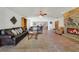 Open-concept living room featuring a stone fireplace and spacious design at 3225 Hargill Dr, Orlando, FL 32806