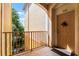 Balcony with railings with building exterior and door number 308 at 3314 Robert Trent Jones Dr # 308, Orlando, FL 32835