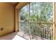 Relaxing screened balcony overlooking lush greenery, offering a peaceful outdoor space at 3314 Robert Trent Jones Dr # 308, Orlando, FL 32835