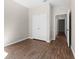 A spacious bedroom with wood-style floors and neutral walls, plus a closet at 3314 Robert Trent Jones Dr # 308, Orlando, FL 32835