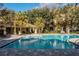 Stunning community pool with a cabana offering a relaxing gathering place at 3314 Robert Trent Jones Dr # 308, Orlando, FL 32835