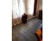 Bedroom featuring laminate flooring, natural light, and tasteful decor at 333 Lake Howard Nw Dr # 302B, Winter Haven, FL 33880