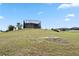 Expansive backyard with fire pit at 36813 Barrington Dr, Eustis, FL 32736