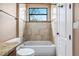 Updated bathroom featuring granite countertop, wood cabinets, tub and shower at 36813 Barrington Dr, Eustis, FL 32736