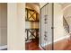 Interior view of wine cellar featuring wood shelving and iron gate at 36813 Barrington Dr, Eustis, FL 32736