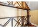 Wine cellar with wooden crossbeam shelving at 36813 Barrington Dr, Eustis, FL 32736